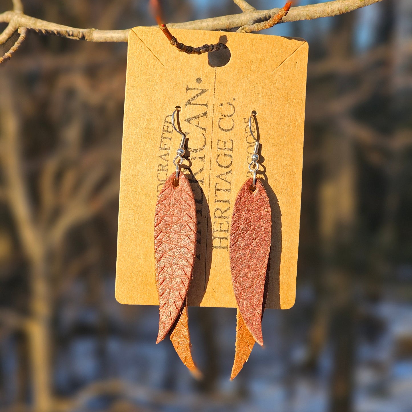 Double Feather Earrings, Mahogany on Buck Brown